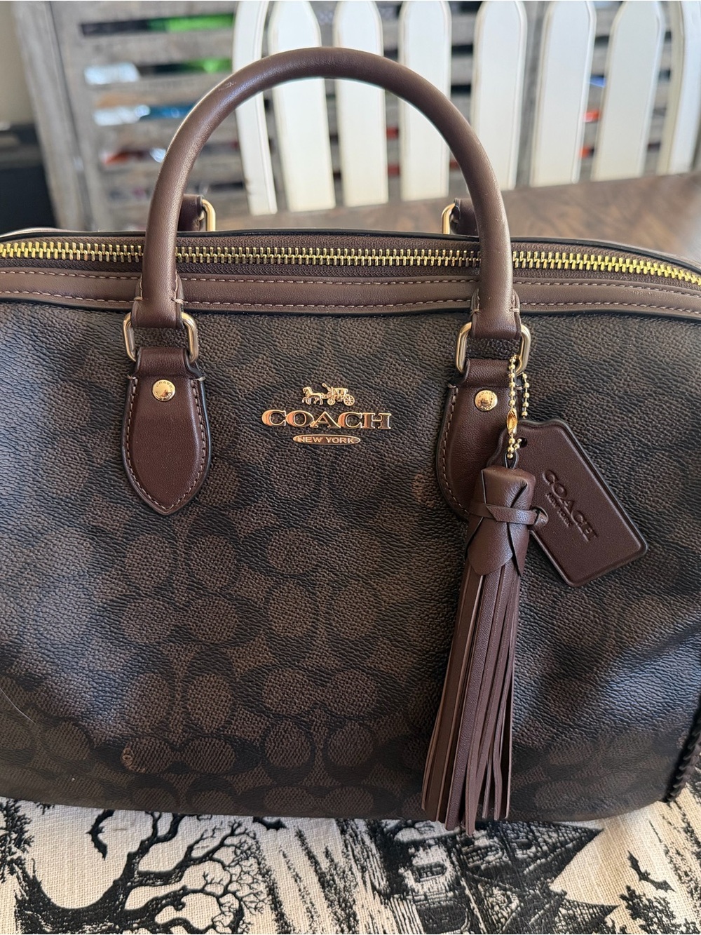 Coach large braided rowen. Used a couple times looks brand new.